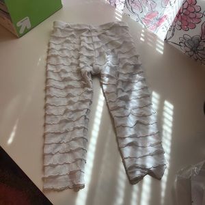 White ruffle pants